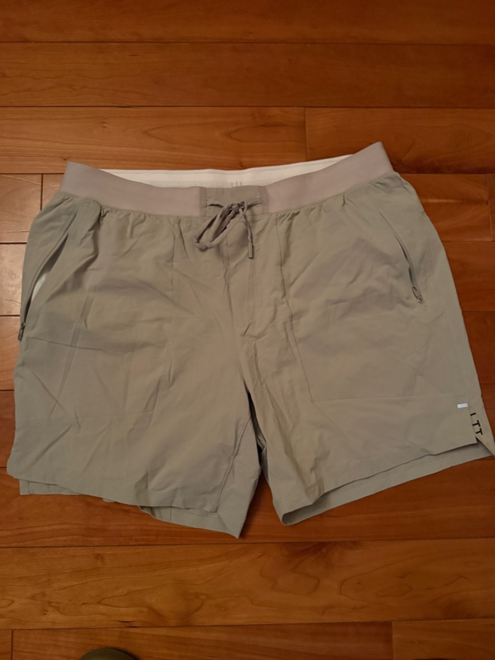 lululemon athletica khaki drawstring shorts with white lining